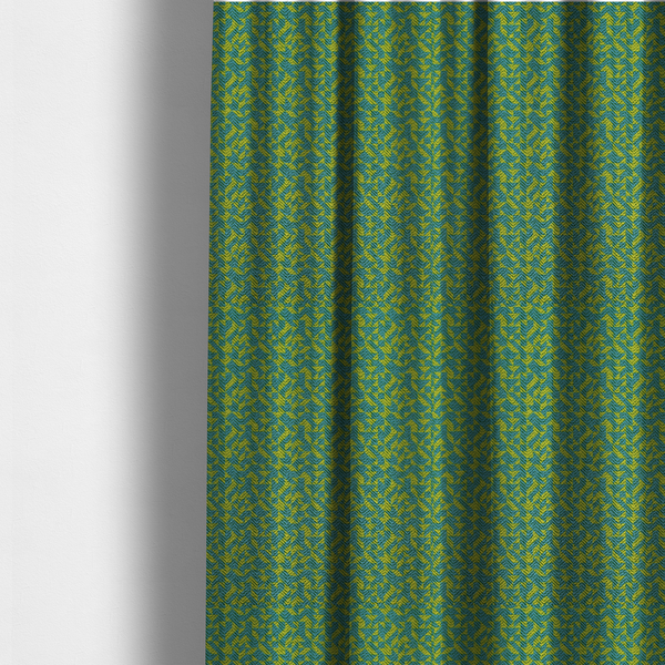 The fabric used to create these made-to-measure curtains has a small, repeated geometric pattern in lime green and blue.