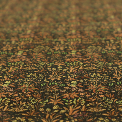 This fabric has a forest/floral design in different warm tones with accents of green foliage.