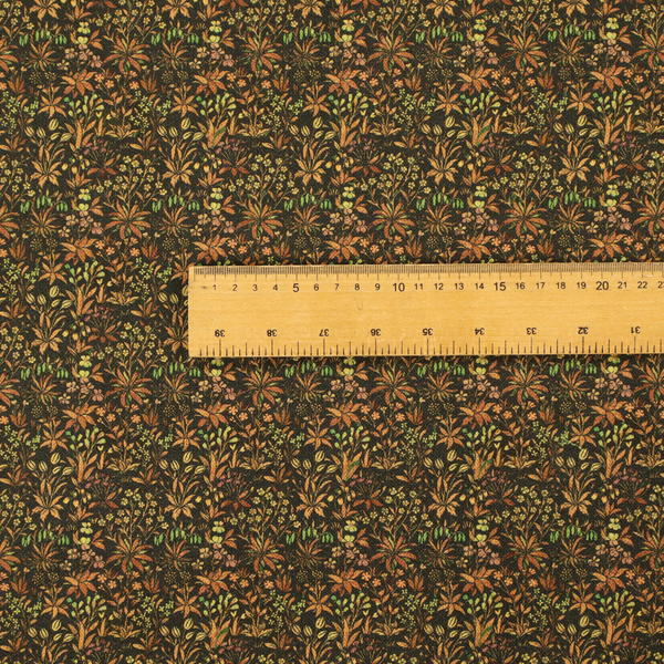 This fabric has a forest/floral design in different warm tones with accents of green foliage.