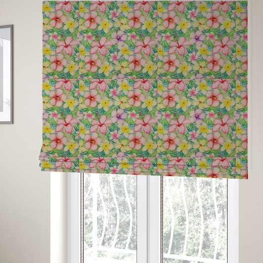 The fabric used to create these bespoke Roman blinds is a vibrant tropical fabric pattern featuring pink and purple hibiscus flowers, yellow plumeria, and green palm leaves on a light grey dotted background.