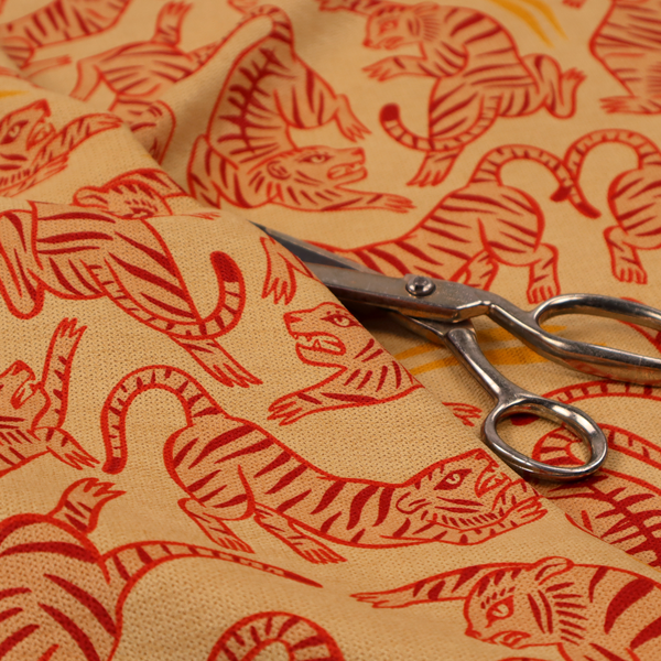 Seamless illustrative pattern featuring leaping red tigers on a warm peach-toned background.