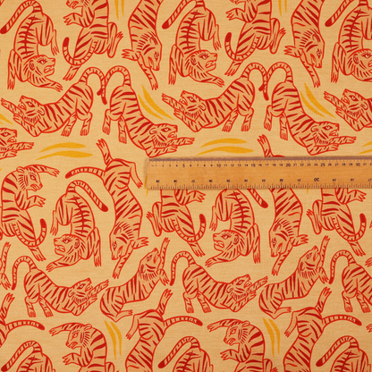 Seamless illustrative pattern featuring leaping red tigers on a warm peach-toned background.