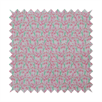 Vertical pink floral branch pattern on white fabric, featuring a delicate blossom and green stem motif.