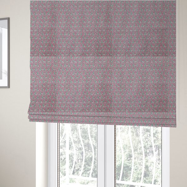 The fabric used to create these Roman blinds has a vertical pink floral branch pattern on white fabric, featuring a delicate blossom and green stem motif.