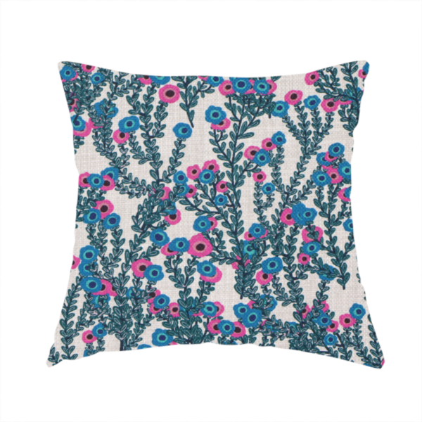 The fabric used to create this handmade cushion is a patterned upholstery fabric with a visible cross-weave texture. The design features a repetitive botanical motif of teal vines and multi-coloured pink and blue flowers on a neutral cream base.