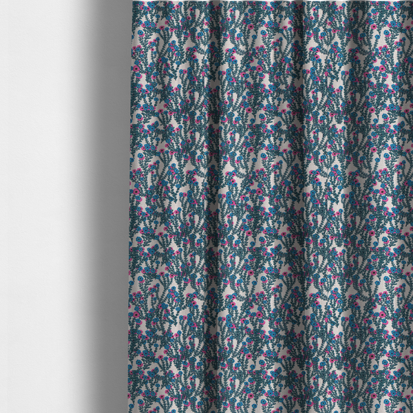 The fabric used to create these made-to-measure curtains is a patterned upholstery fabric with a visible cross-weave texture. The design features a repetitive botanical motif of teal vines and multi-coloured pink and blue flowers on a neutral cream base.