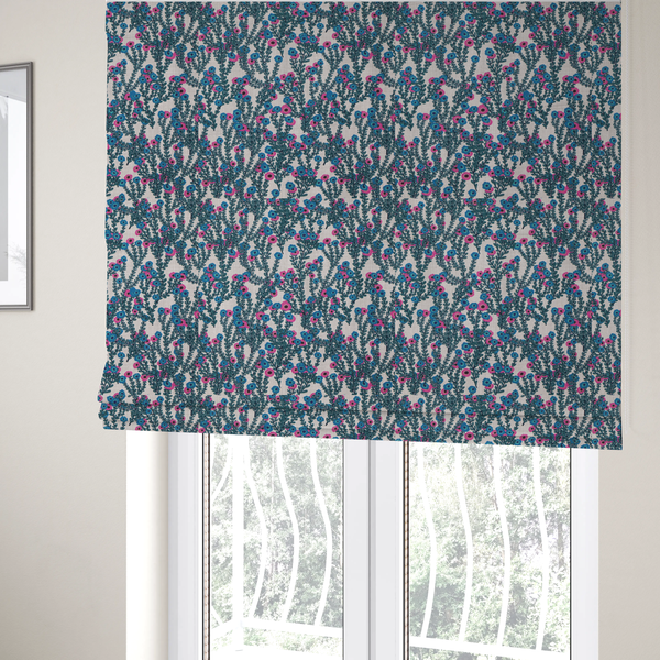 The fabric used to create these bespoke Roman blinds is a patterned upholstery fabric with a visible cross-weave texture. The design features a repetitive botanical motif of teal vines and multi-coloured pink and blue flowers on a neutral cream base.