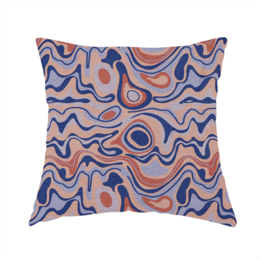 The fabric used to create this handmade cushions is a repeating textile design with a psychedelic, mid-century modern aesthetic. The pattern consists of flowing, organic "liquid" lines and nested concentric shapes resembling a topographical map or marbleized paper. Colours include deep navy blue, warm terracotta, soft peach, and periwinkle.