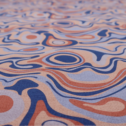 A repeating textile design with a psychedelic, mid-century modern aesthetic. The pattern consists of flowing, organic "liquid" lines and nested concentric shapes resembling a topographical map or marbleized paper. Colours include deep navy blue, warm terracotta, soft peach, and periwinkle.