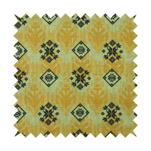 Seamless geometric pattern featuring black and charcoal medallions over a textured yellow and olive green ikat background.