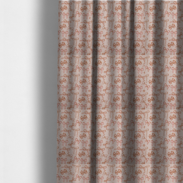 The fabric used to create these made-to-measure curtains includes different shapes and styles of pink bows on a pink background.