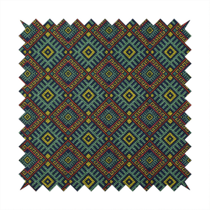 A detailed woven fabric featuring a repeating geometric diamond lattice pattern in shades of teal, mustard yellow, and terracotta red.