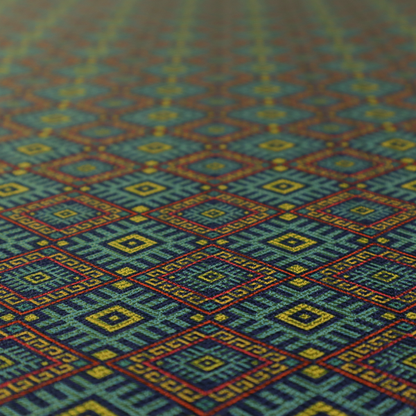 A detailed woven fabric featuring a repeating geometric diamond lattice pattern in shades of teal, mustard yellow, and terracotta red.