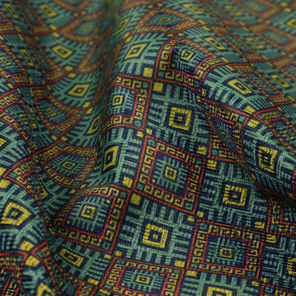 A detailed woven fabric featuring a repeating geometric diamond lattice pattern in shades of teal, mustard yellow, and terracotta red.