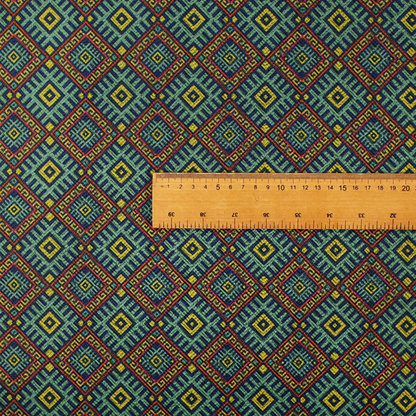 A detailed woven fabric featuring a repeating geometric diamond lattice pattern in shades of teal, mustard yellow, and terracotta red.