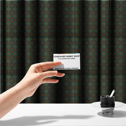 The fabric used to create these made-to-measure curtains is a detailed woven fabric featuring a repeating geometric diamond lattice pattern in shades of teal, mustard yellow, and terracotta red.