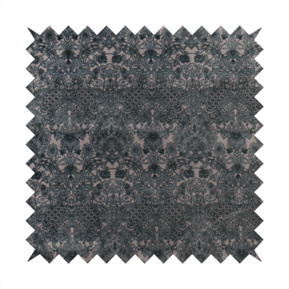 Vintage-inspired charcoal damask upholstery fabric. Ornate baroque floral pattern on a distressed slate grey background, suitable for gothic or French country home decor.