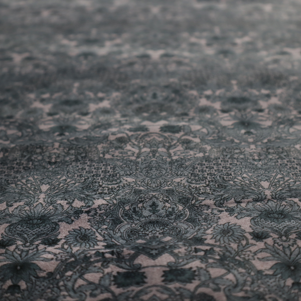 Vintage-inspired charcoal damask upholstery fabric. Ornate baroque floral pattern on a distressed slate grey background, suitable for gothic or French country home decor.