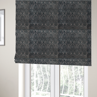 The fabric used to create these Roman blinds is a vintage-inspired charcoal damask upholstery fabric. Ornate baroque floral pattern on a distressed slate grey background, suitable for gothic or French country home decor.
