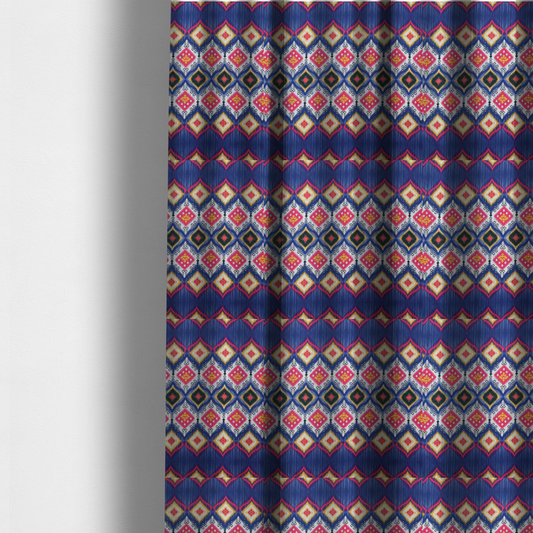 The fabric used to create these made-to-measure curtains is a high-energy textile with a large-scale geometric Ikat design. The pattern showcases concentric diamonds with feathered, "blurred" edges in electric blue, bright pink, and yellow, set against a background with vertical white striations.
