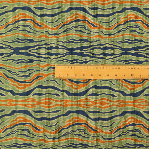 A woven fabric featuring a repeating horizontal wavy pattern in burnt orange, navy blue, and sage green.