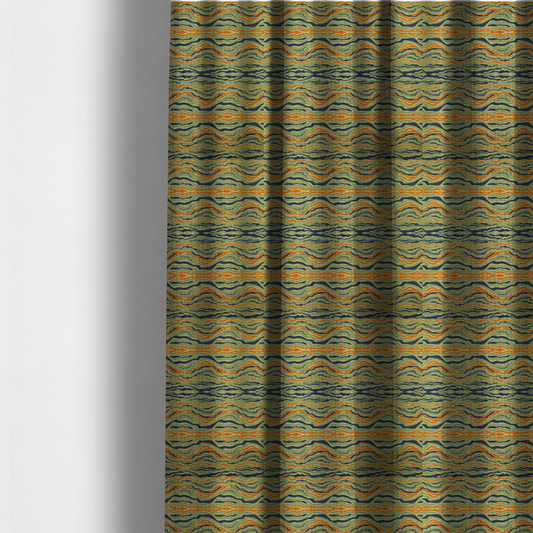 The fabric used to create these made-to-measure curtains is a woven fabric featuring a repeating horizontal wavy pattern in burnt orange, navy blue, and sage green.