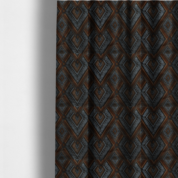 The fabric used to create these made-to-measure curtains is a intricate textile design with a repeating diamond and chevron motif. The pattern features fine, hand-inked linework, including Greek key patterns and zig-zags. The colour palette is a moody mix of earthy terracotta, deep grey, and black, giving it a rustic, bohemian feel.