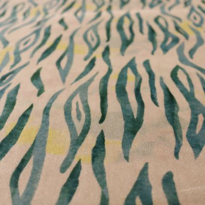 Vertical hand-painted stripes resembling an organic animal print. The design features soft, bleeding edges in various shades of green and muted teal over a warm sandstone or blush background, accented with small pops of yellow.