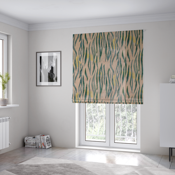 The fabric used for these Roman blinds is a vertical hand-painted stripes resembling an organic animal print. The design features soft, bleeding edges in various shades of green and muted teal over a warm sandstone or blush background, accented with small pops of yellow.