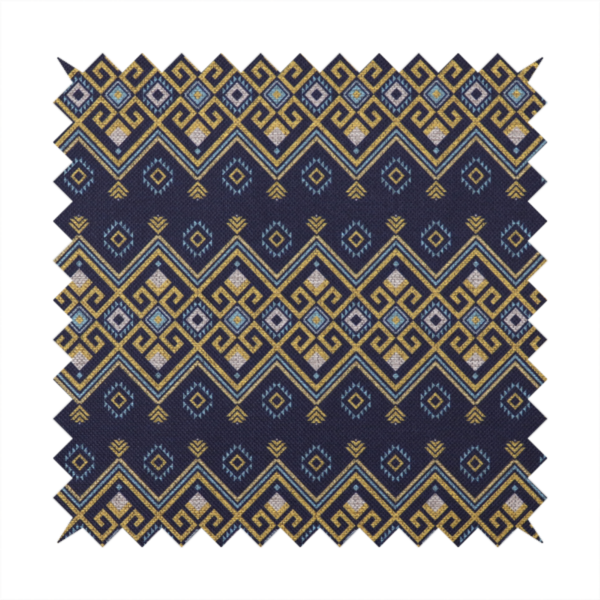 A horizontal Southwestern-inspired geometric pattern featuring navy blue bands with mustard yellow and sky blue interlocking diamonds and Greek key motifs.