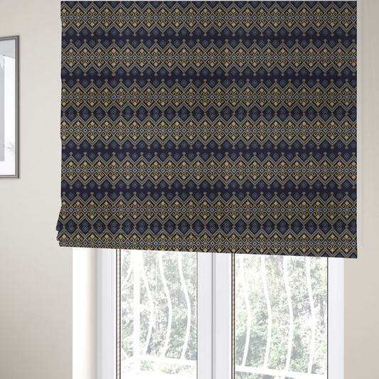 The fabric used to create these Roman blinds is a horizontal Southwestern-inspired geometric pattern featuring navy blue bands with mustard yellow and sky blue interlocking diamonds and Greek key motifs.