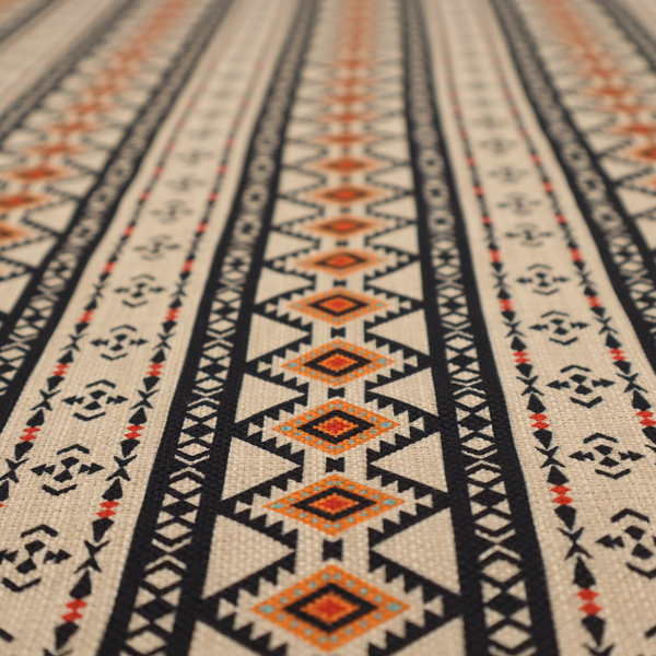 Intricate tribal border print arranged in vertical columns on a visually textured, linen-look base. The design includes repeating rows of rust-orange diamonds, black zig-zags, and arrow-like geometric motifs with a hand-drawn aesthetic.