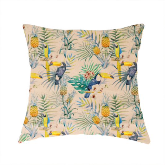 The fabric used to create this handmade cushion is a tropical watercolour pattern featuring perched toucans, parrots, and pineapples surrounded by lush palm leaves on a cream background.