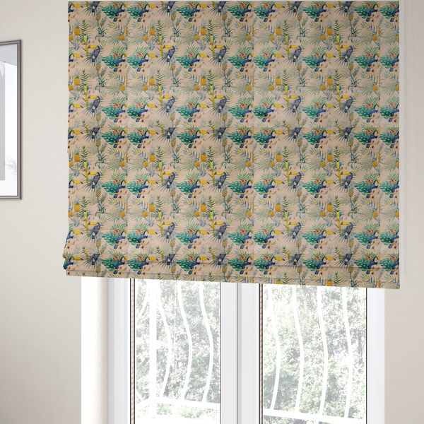 The fabric used to create these Roman blinds is a tropical watercolour pattern featuring perched toucans, parrots, and pineapples surrounded by lush palm leaves on a cream background.