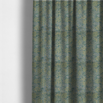 The fabric used for these made-to-measure curtains is a muted green textile print with a complex, repeating botanical motif. The design features tightly packed five-petal flower clusters and delicate willow-like leaves in shades of dusty sage, teal, and pale lime green.