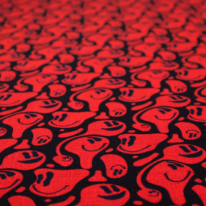A repeating psychedelic pattern of vibrant red melting smiley faces and abstract kidney shapes set against a dark black background.