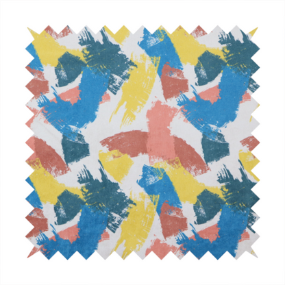 Vibrant textile print featuring large, expressive paint swipes in cornflower blue, sunny yellow, terracotta red, and dark teal. The brushstrokes overlap to create a sense of movement and have a visible, dry-brush texture with distressed edges.