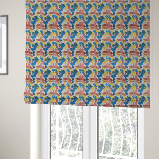 The fabric used to create these Roman blinds is a vibrant textile print featuring large, expressive paint swipes in cornflower blue, sunny yellow, terracotta red, and dark teal. The brushstrokes overlap to create a sense of movement and have a visible, dry-brush texture with distressed edges.