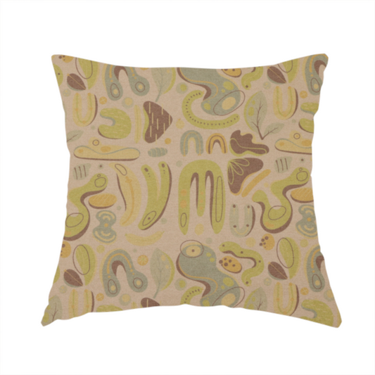 The fabric used to create this handmade cushion is an abstract repeating pattern on a beige fabric background, featuring organic, amoeba-like shapes in earthy tones of olive green, muted yellow, and light brown. The design includes various fluid forms: U-shapes, elongated ovals, leaf-like outlines, and speckled pods. Some shapes are solid, while others contain interior lines, dots, or smaller concentric forms, creating a playful, mid-century modern or retro aesthetic with a soft, matte textile texture.