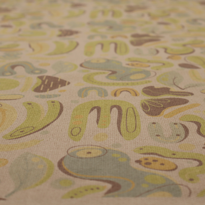 An abstract repeating pattern on a beige fabric background, featuring organic, amoeba-like shapes in earthy tones of olive green, muted yellow, and light brown. The design includes various fluid forms: U-shapes, elongated ovals, leaf-like outlines, and speckled pods. Some shapes are solid, while others contain interior lines, dots, or smaller concentric forms, creating a playful, mid-century modern or retro aesthetic with a soft, matte textile texture.