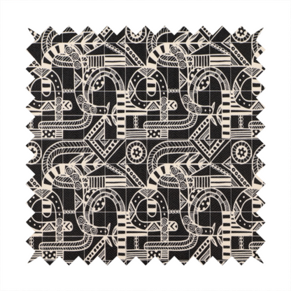 An intricate black and white repeating pattern featuring a grid of tribal-inspired geometric motifs. The design displays stylized, interlocking serpentine and curved forms filled with detailed line work, dots, and hatch marks. Circular gear-like symbols and triangular accents create a structured, rhythmic composition with a high-contrast, hand-drawn aesthetic on a textured fabric.