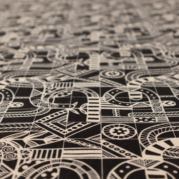 An intricate black and white repeating pattern featuring a grid of tribal-inspired geometric motifs. The design displays stylized, interlocking serpentine and curved forms filled with detailed line work, dots, and hatch marks. Circular gear-like symbols and triangular accents create a structured, rhythmic composition with a high-contrast, hand-drawn aesthetic on a textured fabric.