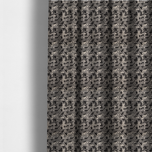 The fabric used to create these made-to-measure curtains is an intricate black and white repeating pattern featuring a grid of tribal-inspired geometric motifs. The design displays stylized, interlocking serpentine and curved forms filled with detailed line work, dots, and hatch marks. Circular gear-like symbols and triangular accents create a structured, rhythmic composition with a high-contrast, hand-drawn aesthetic on a textured fabric.