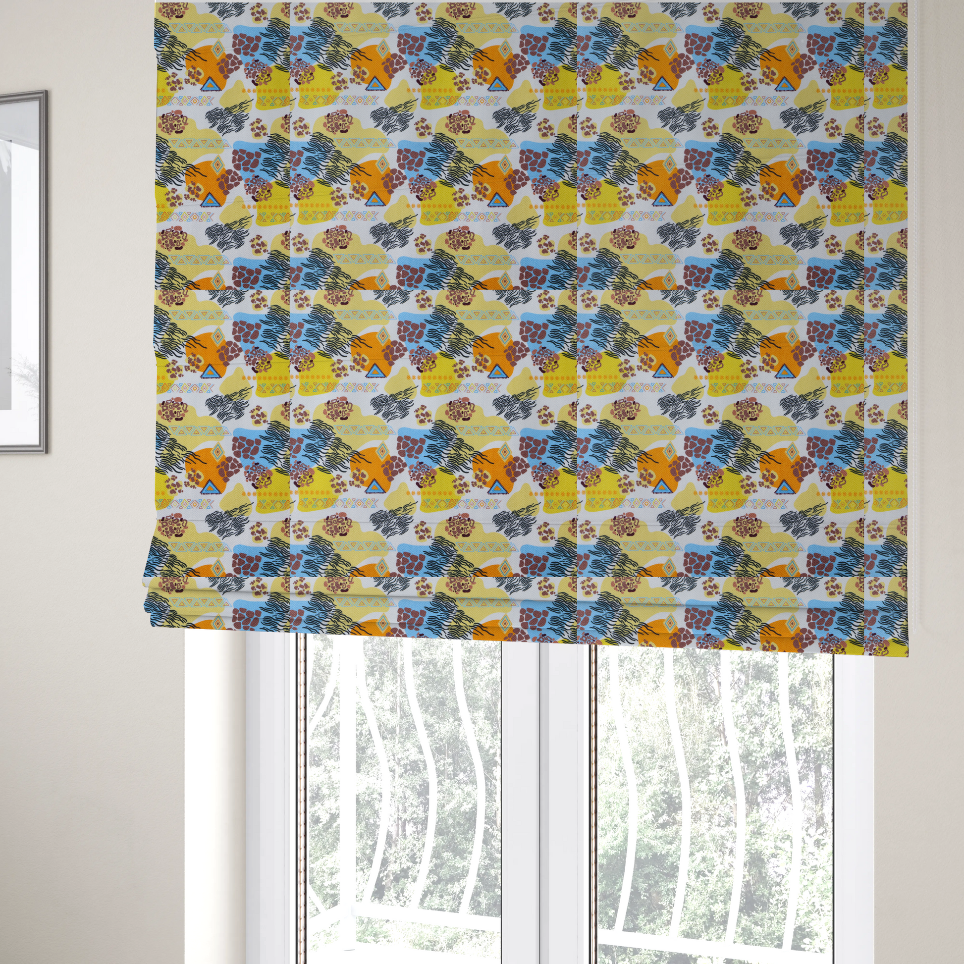 The fabric used to create these Roman blinds is a vibrant, safari-themed repeating pattern on a white textured fabric, blending abstract shapes with traditional animal and tribal motifs.