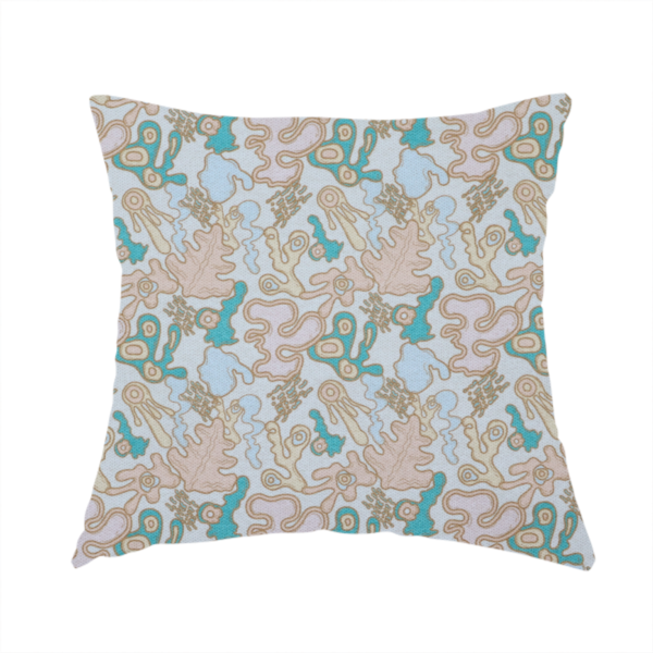 The fabric used to create this handmade cushion is a light blue fabric featuring a whimsical, abstract botanical pattern. The design is composed of organic, flowing shapes and illustrations in a pastel and jewel-tone palette.