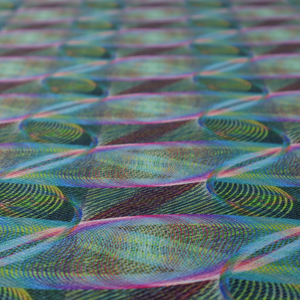 This fabric features a dynamic, futuristic geometric pattern in shades of pink, blue and green, with a mesmerizing sense of movement and depth.