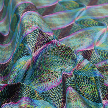 This fabric features a dynamic, futuristic geometric pattern in shades of pink, blue and green, with a mesmerizing sense of movement and depth.