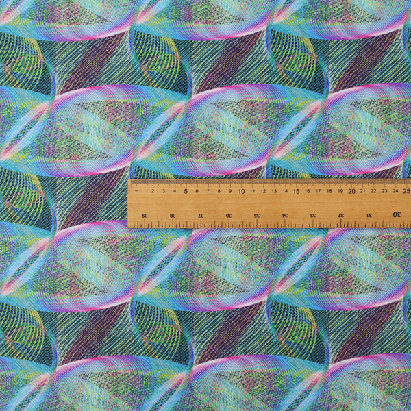 This fabric features a dynamic, futuristic geometric pattern in shades of pink, blue and green, with a mesmerizing sense of movement and depth.