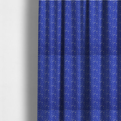 The fabric used to create these made-to-measure curtains is a bright cobalt blue fabric with a dense, non-directional "speckle" or "splatter" pattern.