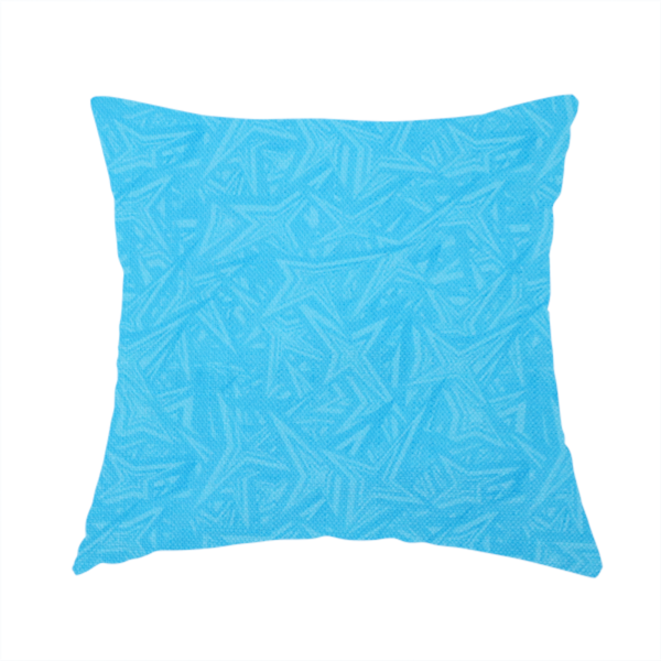 The fabric used to create this handmade cushion is a vibrant cyan-coloured fabric featuring a subtle, tonal geometric pattern.